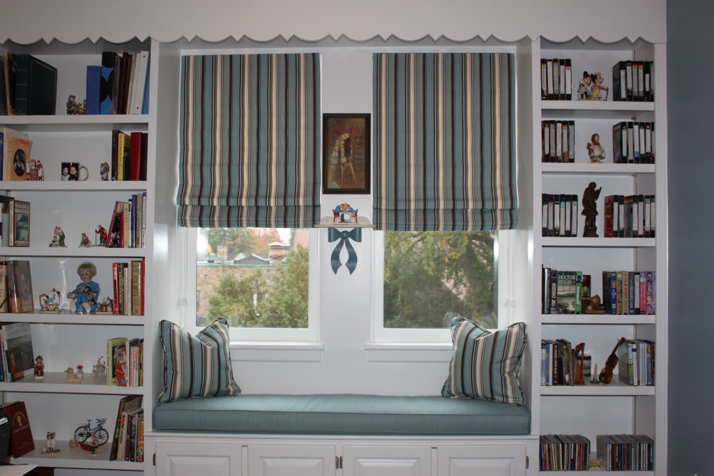 Window seat with Roman Shades and pillows