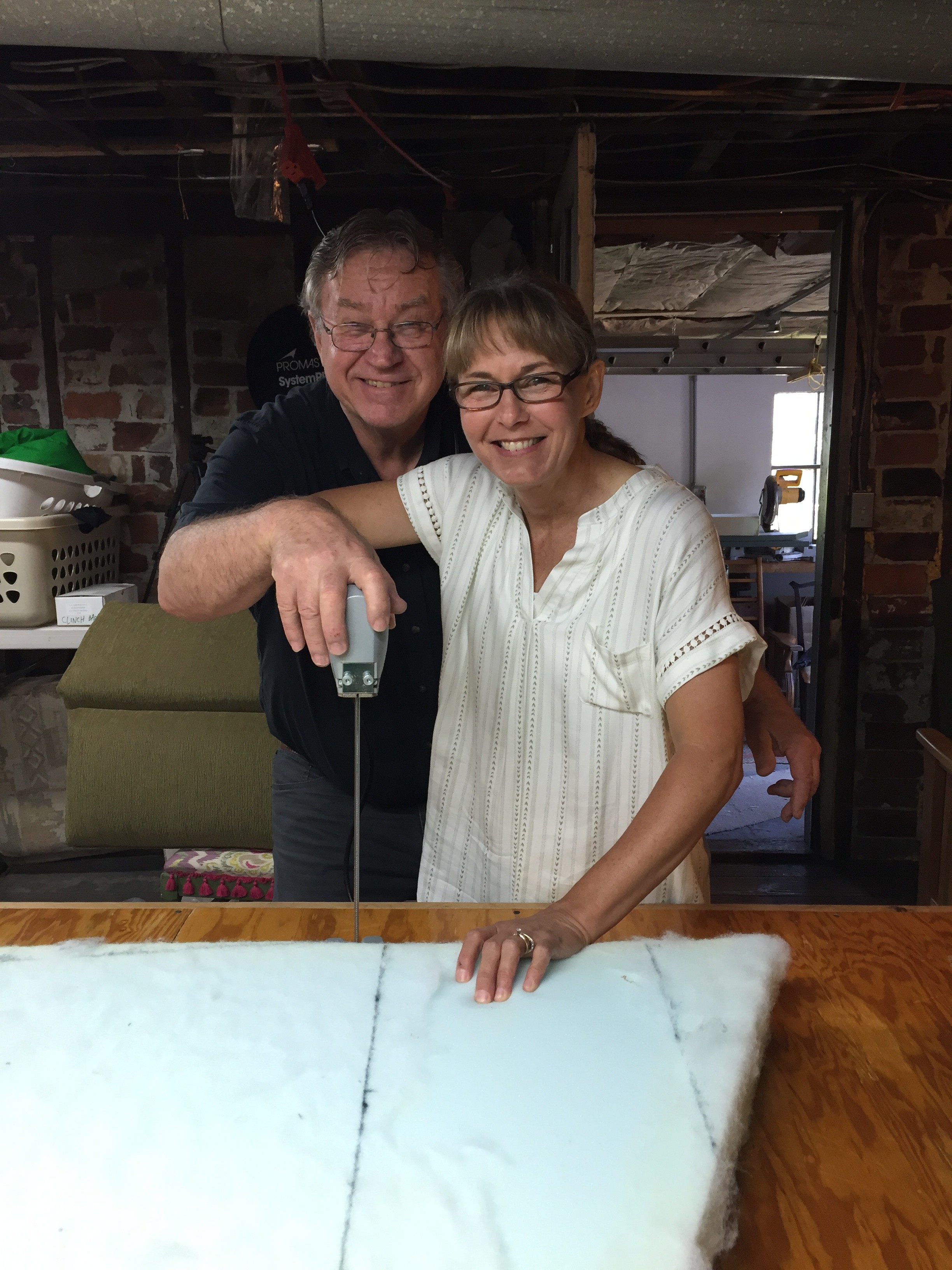 Bill shows Tracy how to use the foam saw