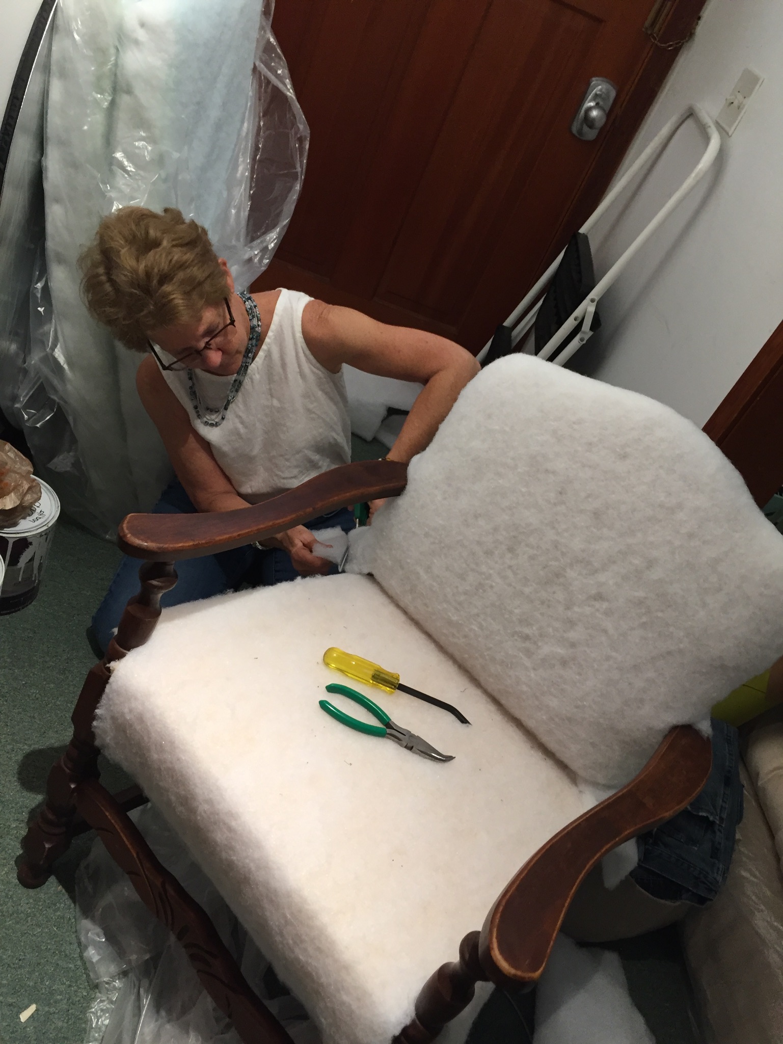 Kims Upholstery Workshop Donna padding her wooden arm chair