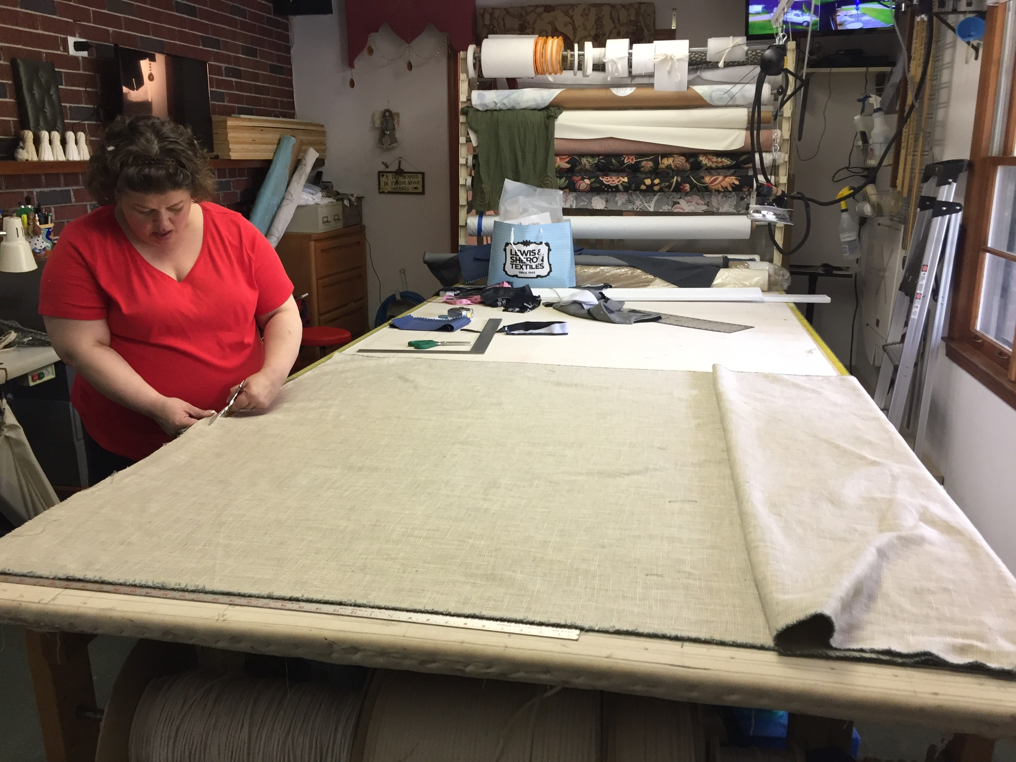 Donna plans her cuts for the upholstery workshop