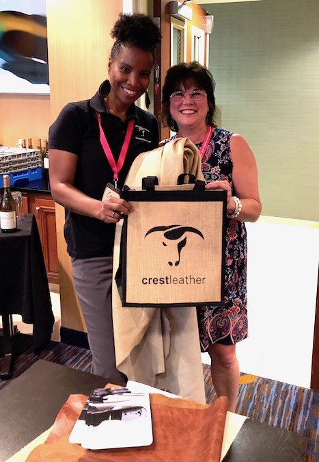 Crest Leather - Presents Kim with a hide of leather