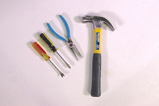 Hammer, screw driver, pliers, tack puller