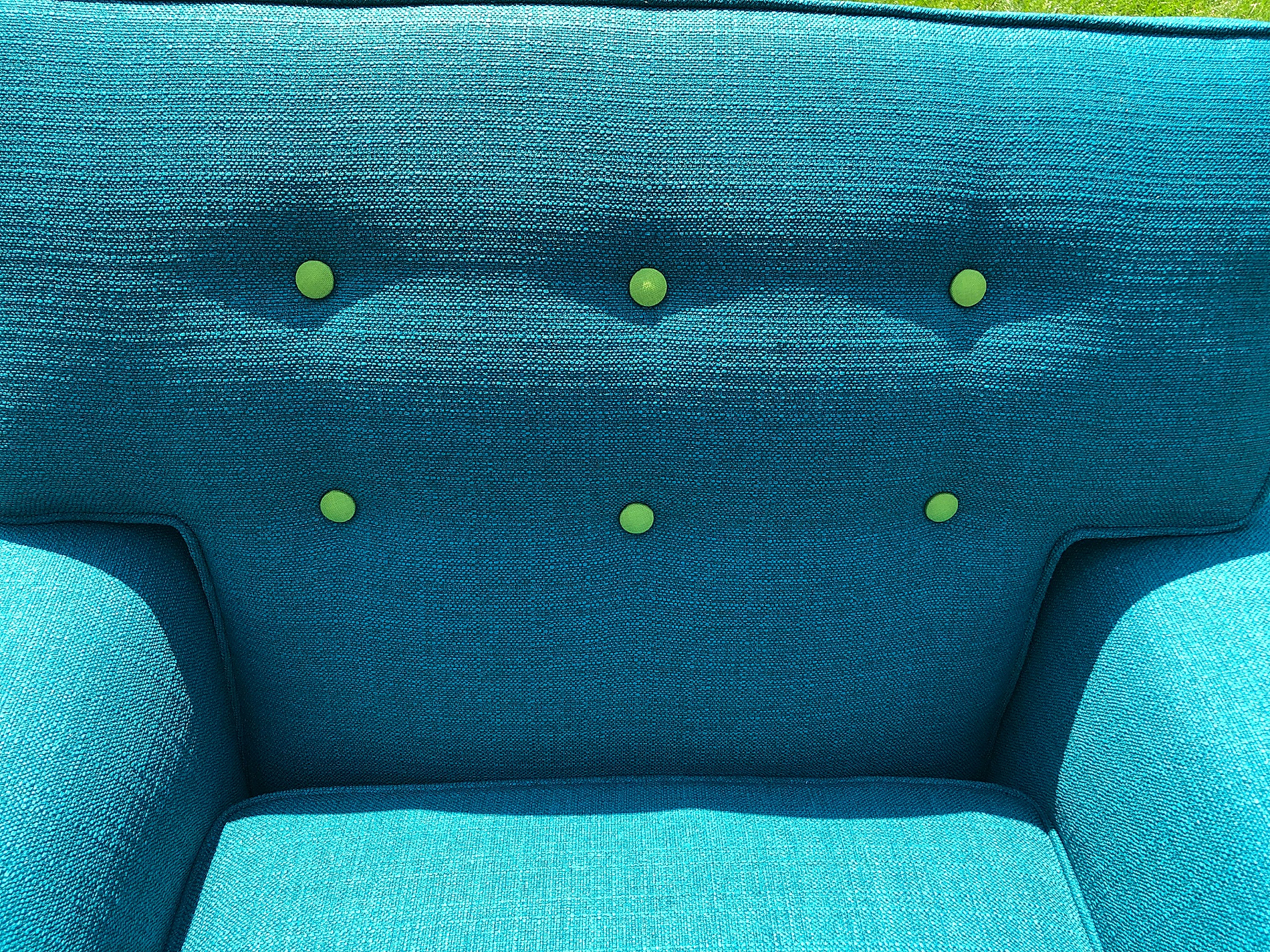 contrasting decorative buttons to make a chair pop