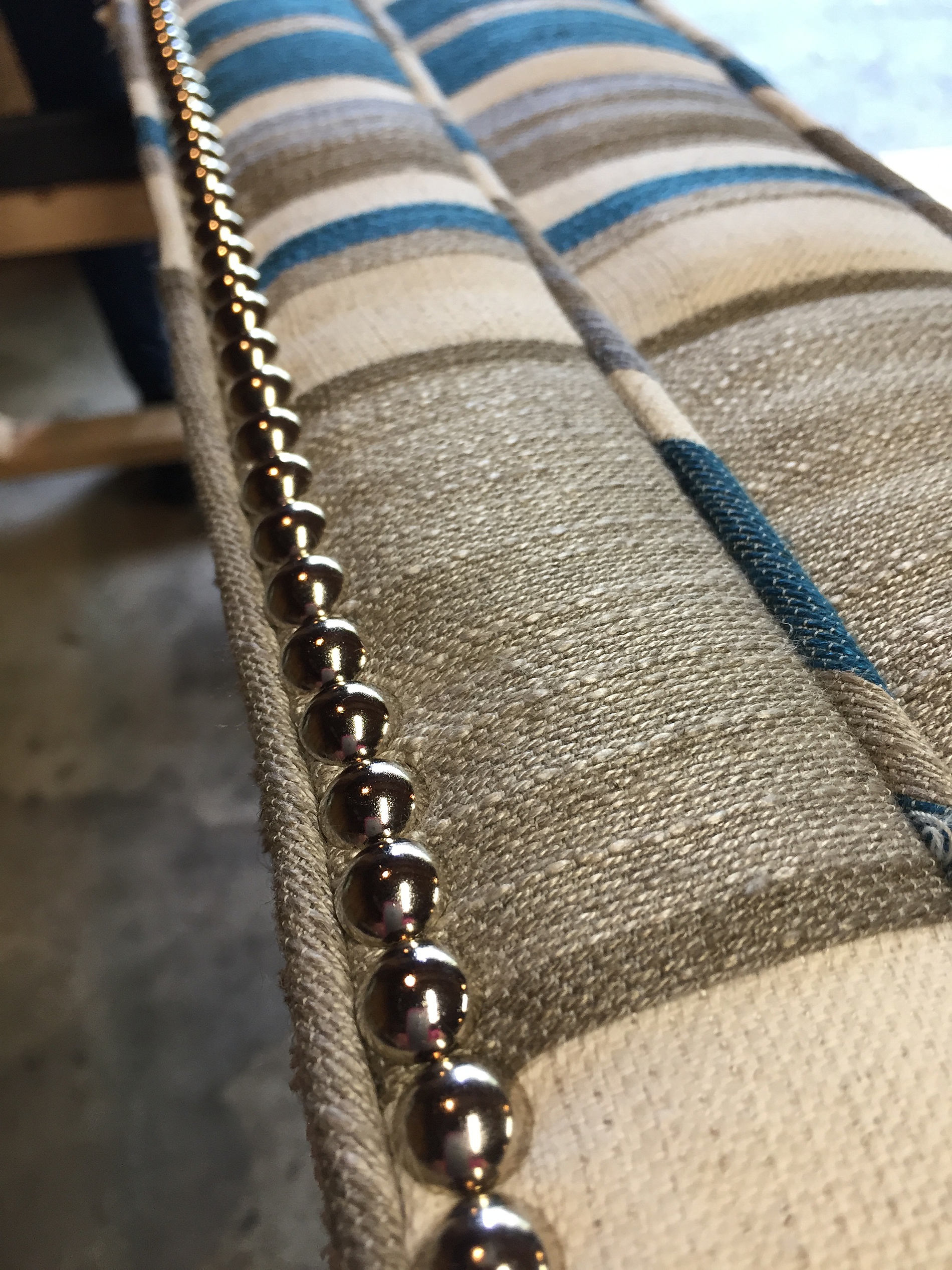 cording detail and decorative tacks on Final Phase of Reupholstered chair