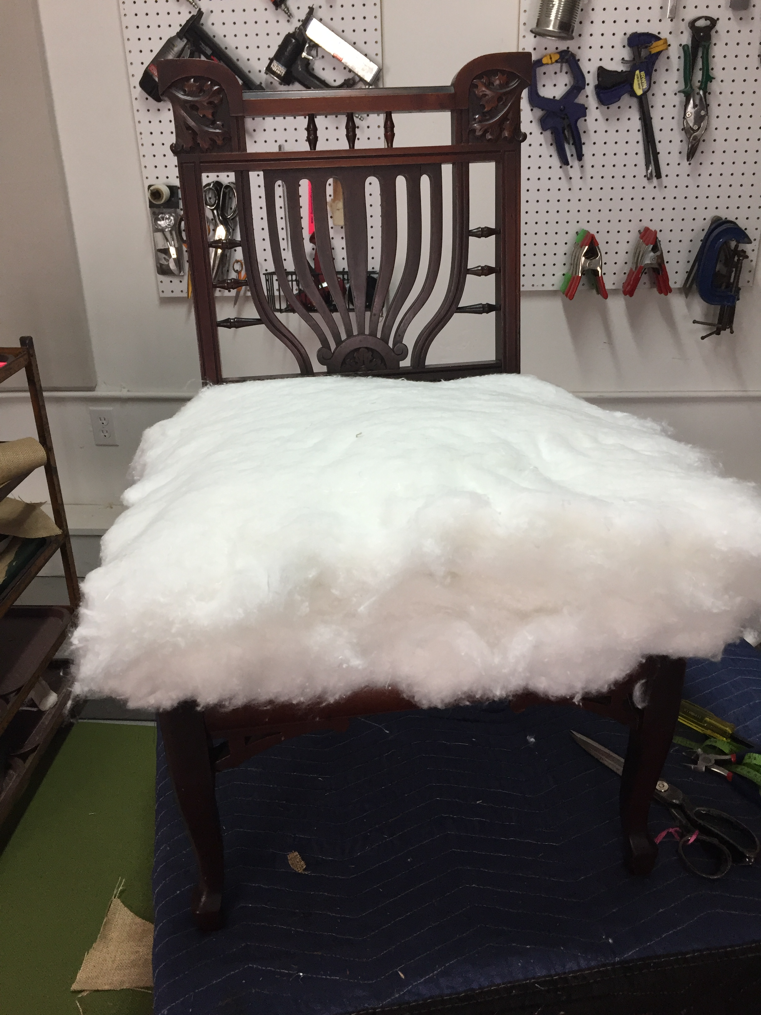 Phase Three of Reupholstering Furniture | Using Cotton for padding