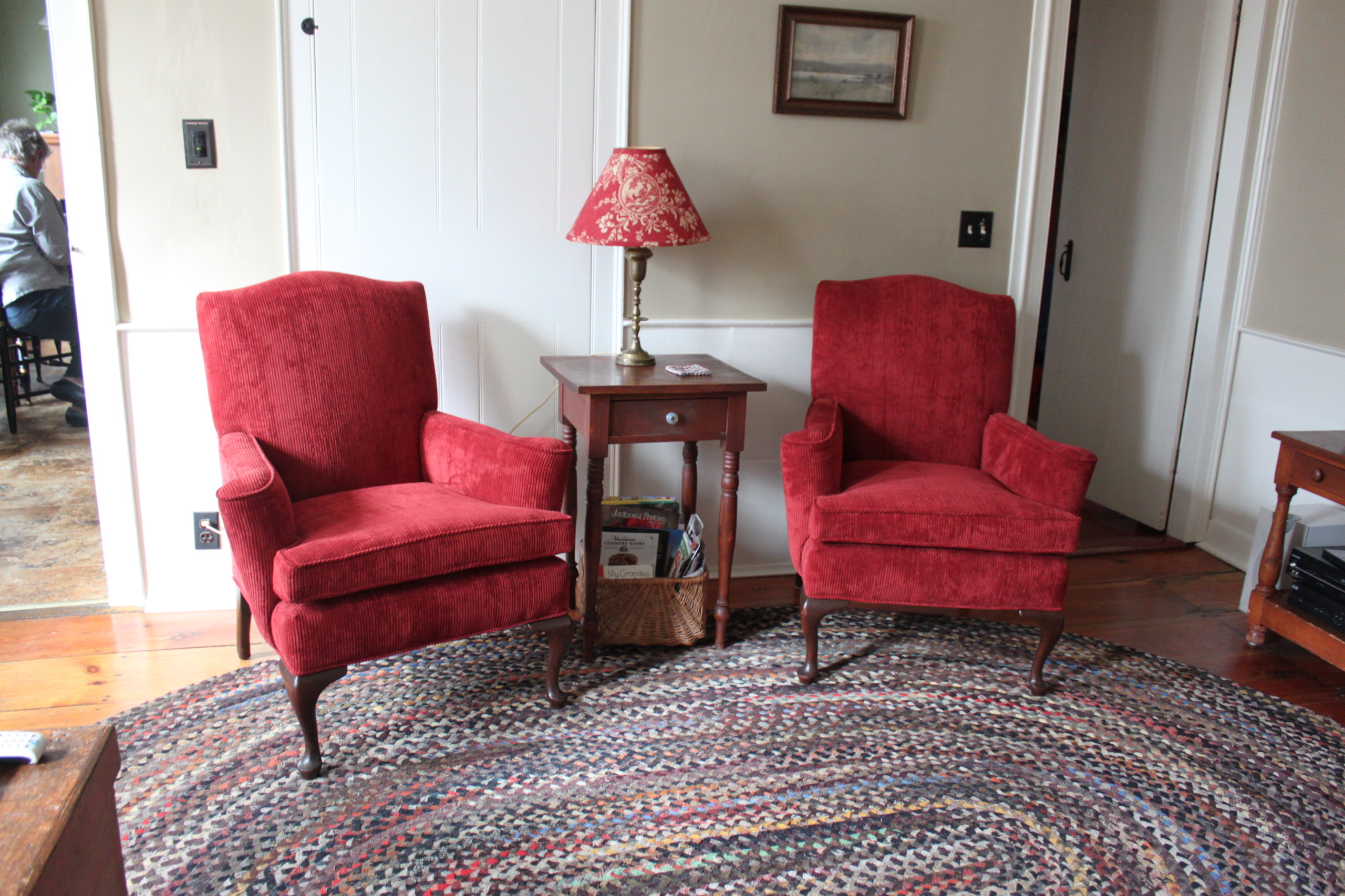 red reupholstered chairs