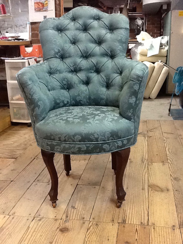 reupholstery project a teal Tufted vintage chair